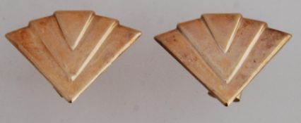 A pair of 9ct gold earrings in the Art D
