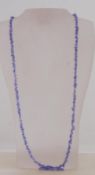 A tanzanite bead necklace. Measures 34 i