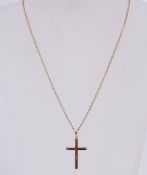 A 9ct gold pendant necklace strung with