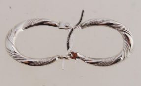 A pair of 9ct white gold creole earrings