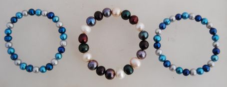 3 baroque pearl bracelets.