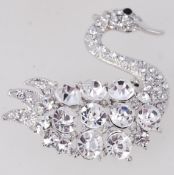 A rhinestone vintage Swan brooch which i