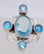 A contemporary 925 silver ring with a bl