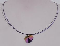 A contempory pendant necklace by Carrie