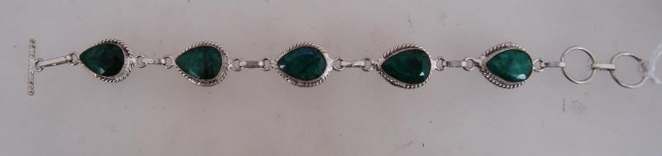 A 925 silver braclet with faceted green