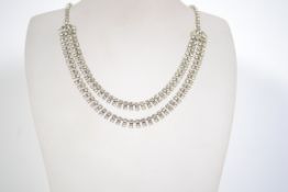 A good vintage white metal rhinestone prom necklace set with clear rhinestones joining marquise