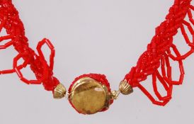 A red coloured 1960's glass bead festoon