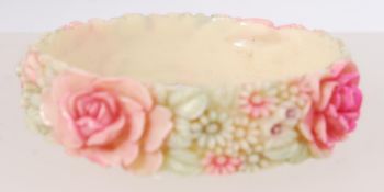 A celluloid vintage cream coloured bangl