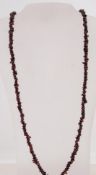 2 garnet glass bead necklaces. Measures