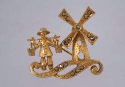 A vintage marcasite brooch in a gold tone setting, with a rollover clasp. Measuring 3cms long.