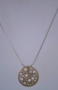 A silver and diamond pendant on a chain, both are marked 