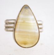 A large silver and agate ring with a 