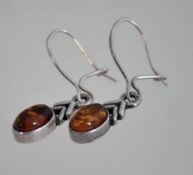 A pair of silver and amber earrings, marked 