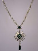 A 1960s hook fastening rhinestone necklace with a silver tone setting, measuring 46.5cms long.