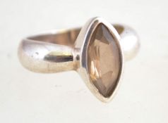 A silver and smokey quartz ring, marked 