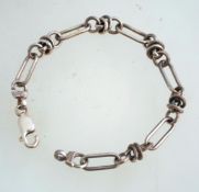 A half-ounce silver fancy link braclet, marked 