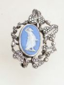 A vintage silver and marcasite brooch measuring 4.