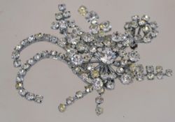 A very large 1950s rhinestone spray brooch in a silver tone setting with a roll over clasp,
