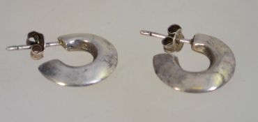 A pair of silver graduated ball earrings, marked 
