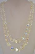A large 1950s aurora crystal bead double strand necklace with a rhinestone box clasp.