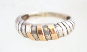 A vintage silver and gold overlay ring. It is unmarked, but tests as silver.