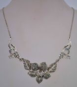 A 1950s marcasite necklace in silver tone metal with a bolt ring clasp. Measuring 40cms long.