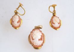 A vintage 9 carat gold cameo pendant and a screw earring set marked 