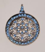 A 1920s to 1930s rhinestone pendant, in silver plated brass with pale blue rhinestones,