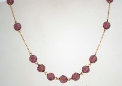 3 1930s crystal necklaces, 2 amethyst colour with hook fastening clasps,