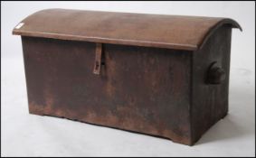 An unusual 20th century large metal chest of dome form and very heavy construction.