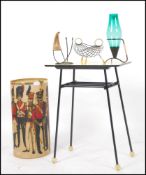 A 1950's yellow formica on metal pin leg side table.