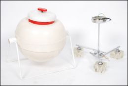 A contemporary chrome and resin set chandelier in the modernist style together with a retro 1970's