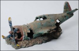 A large unusual resin cast model of an underwater crashed - relic world war 2 aeroplane ( see