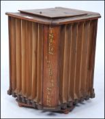 A vintage 1950's oak haberdashery Lister sewing accessory shop display revolving unit complete with