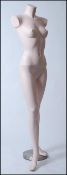 An Adel Rootstein style mannequin of female form , full life size on a heavy chrome base ,