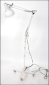 A freestanding Herbert Terry Industrial 1970's floor standing anglepoise lamp on trolley.