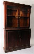 A Victorian pitch pine country estate library bookcase cupboard.