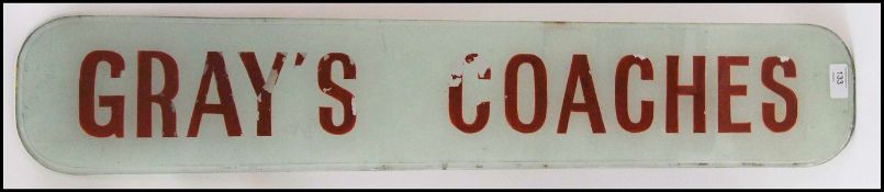 A large rare vintage retro Grey's Coaches glass advertising sign in original condition taken from