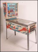 A 1975 Gottlieb Quick Draw Pinball ( Pin Ball ) machine (2 player) dating to the 1970's raised on