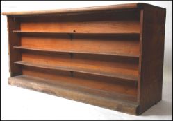 An early 20th century solid oak shop haberdashery display counter.