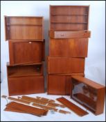 A superb 1970's retro Swedish PS system of modular form comprising cabinets and shelves complete