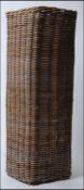 An unusual large whicker basket of tall square form believed to be early 20th century and used for