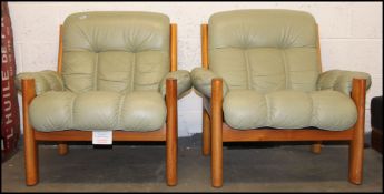 2 Ekornes retro Scandinavian ' Montana ' armchairs in pale green leather with angular solid teak