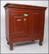 A continental 19th century painted pine Industrial / school cupboard raised on unusual legs with