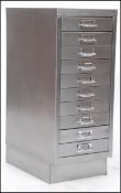 A polished steel mid century Industrial factory pedestal 10 drawer filing cabinet.