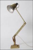 A pre war 1940's Herbert Terry anglepoise desk lamp with original mottled paint work.