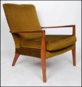 A retro mid century Danish type armchair having show wood angular teak frame with flat elbow