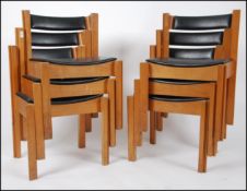 A set of 6 beech and vinyl upholstered stacking chairs by Clive Bacon dating to the 1960's.