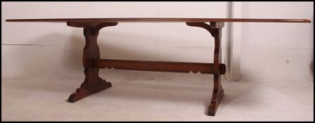 A large Golden Dawn Ercol refectory dini