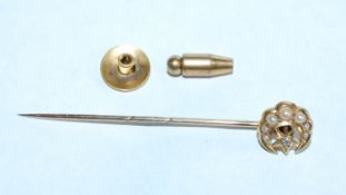 An 18ct gold Victorian stud and pin brooch set with diamonds and pearls in a crescent moon form.